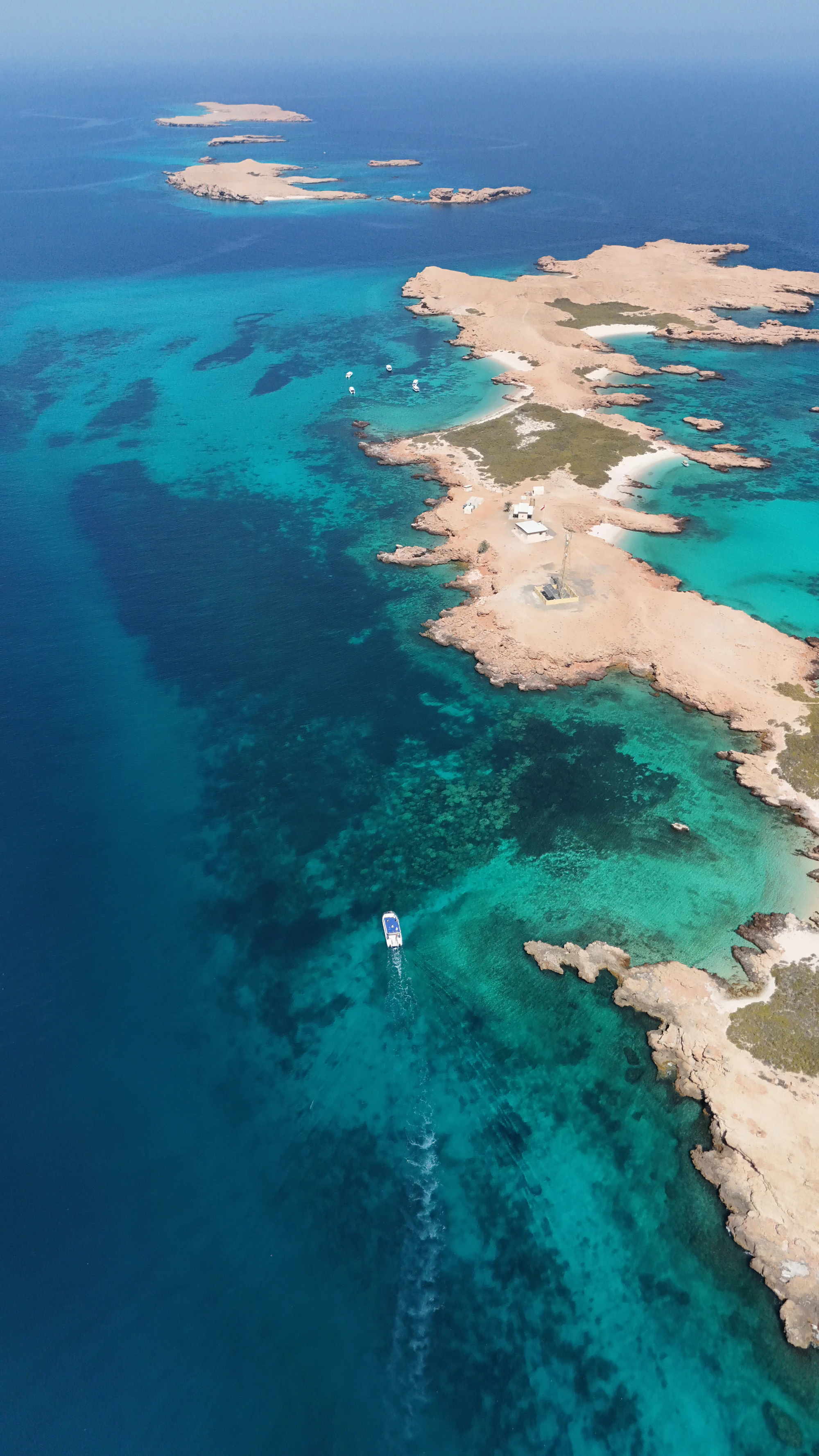 A MolaMola boat heading along the Daymaniyat Islands